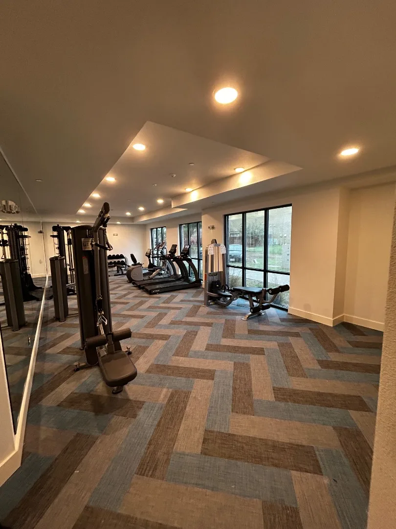 Finished apartment amenity gym installed by our team