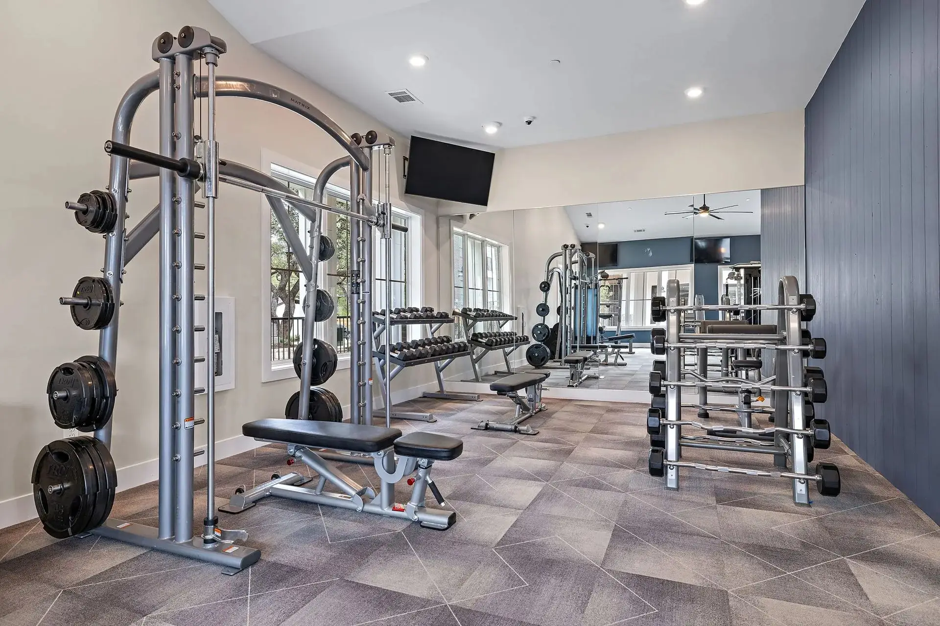 Power rack and Smith machine on protective rubber flooring