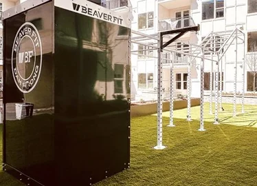 Outdoor rig with integrated equipment storage