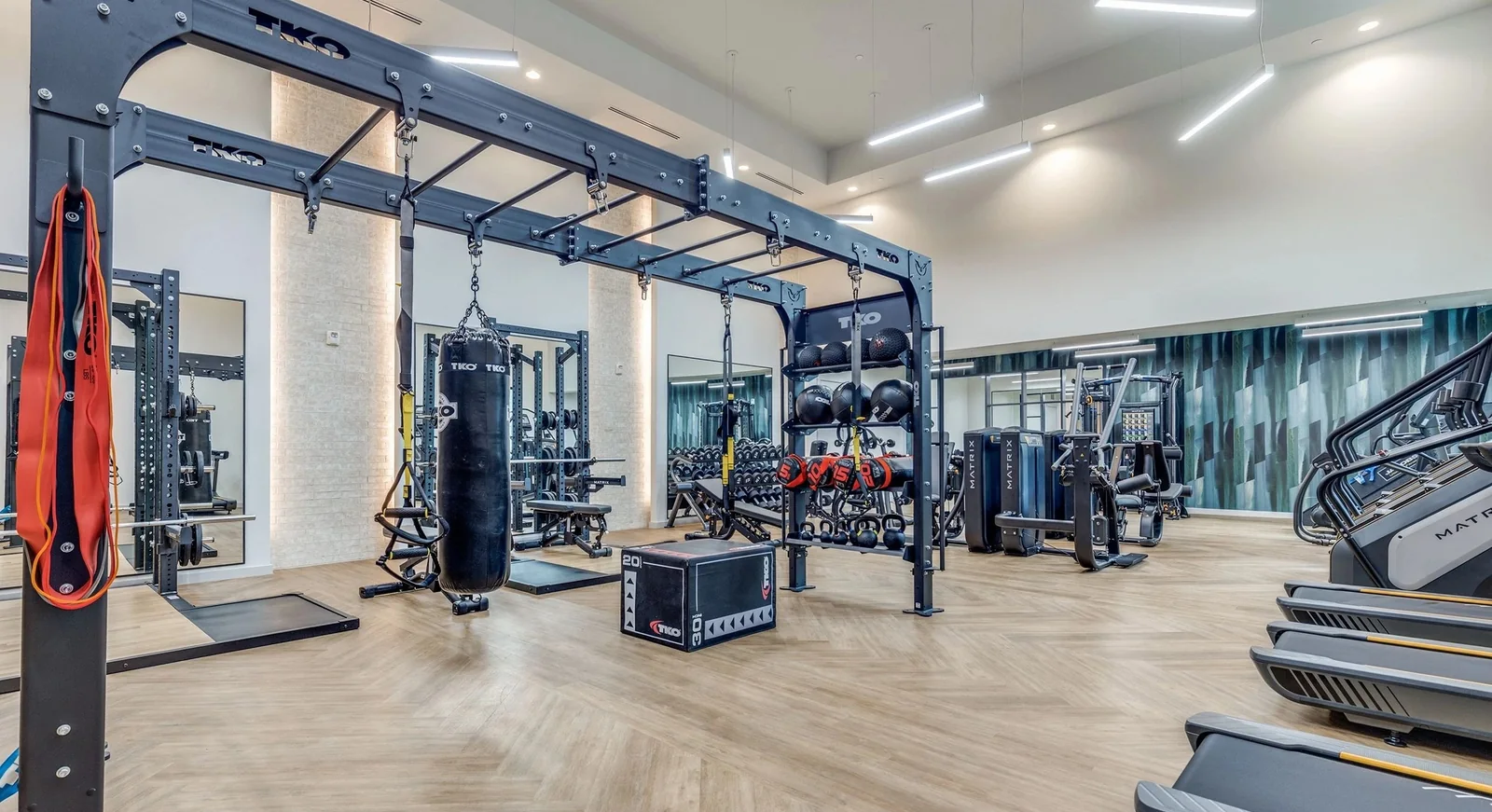 Fitness floor with a TKO storage rig and Matrix cardio line