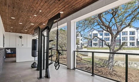 Weather-rated training rig under a covered patio